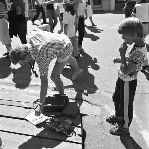 Holiday makers watching Punch and Judy show 2