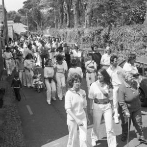people walking in procession