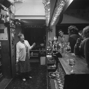 Jean Luke behind the bar