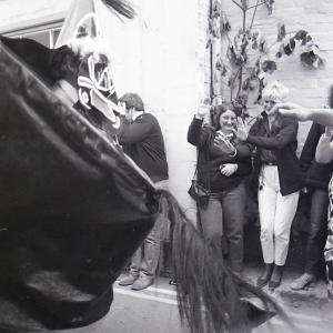 Old Oss in street, being waved at
