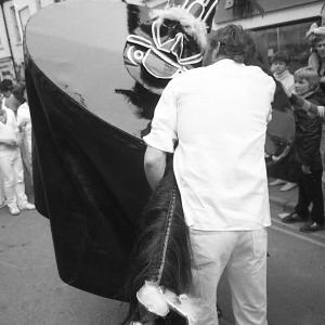 Man holding Old Oss' mane