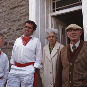 People stood in house doorway