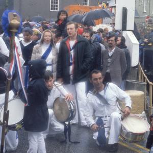 Blue Ribbon band with Master of Ceremonies in rain