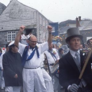 Blue Ribbon band with Master of Ceremonies in rain