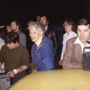 Night time, men with boom boxes