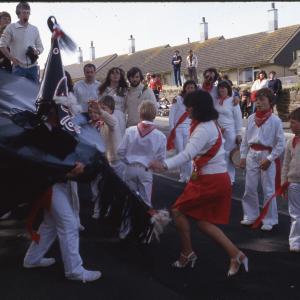 Children's Oss with woman teasing