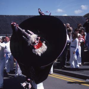 Blue Ribbon Oss dancing in road
