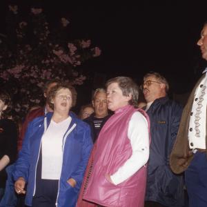 People singing at night