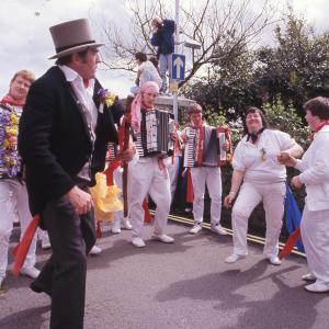 Old Oss Master of ceremonies leading accordion players