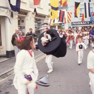 Girl teasing Old Oss in town