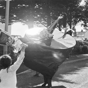 Little boy teasing Old Oss