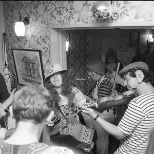 Merrymakers musicians in pub 