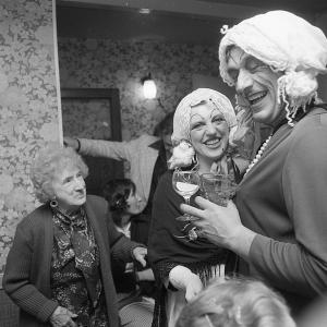 Merrymakers dressed up in pub