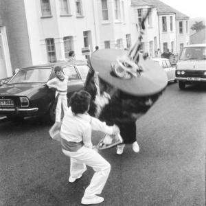 children teasing old oss