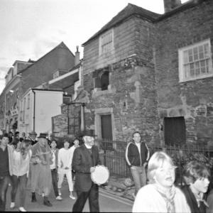 People singing and walking