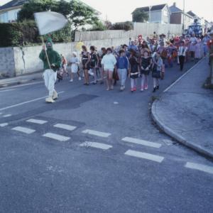 people dressed as crisps in parade