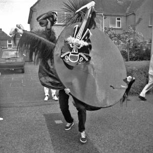 Old Oss dancing in street