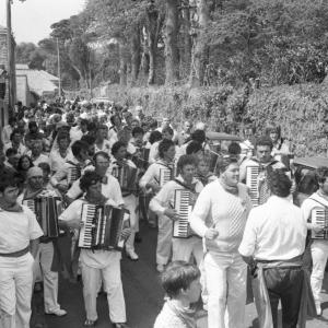 accordion players in procession