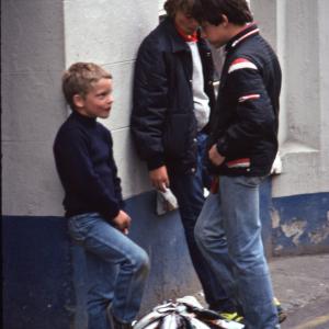 Boys with pile of mackerel