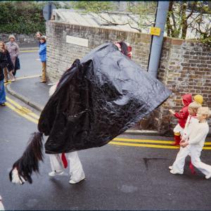 Old Oss chased by children 