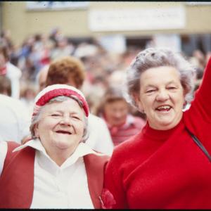 Portrait of two women from Old Oss party cheering