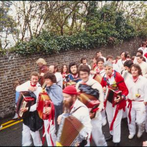 Old Oss procession led by band