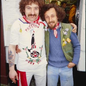 Man with homemade Obby Oss shirt and another man