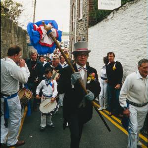 Blue Ribbon Master of Ceremonies leading procession