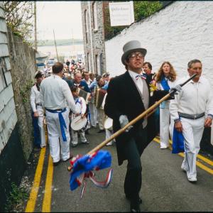 Blue Ribbon Master of Ceremonies leading procession 