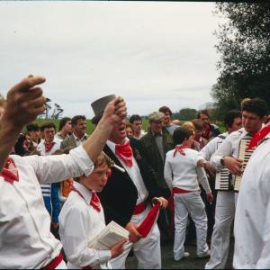 Old Oss party singing with Master of Ceremonies