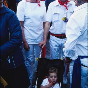 Man and woman with baby in pushchair