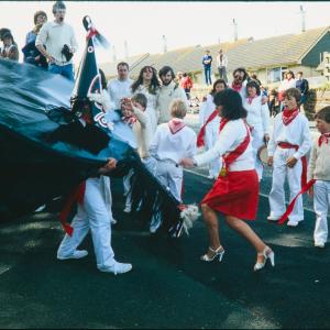 Children's Oss with woman teasing