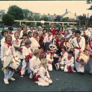 Children's Oss group posing for a photo with Old Oss