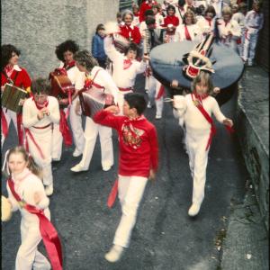 Children's Oss procession walking with Old Oss