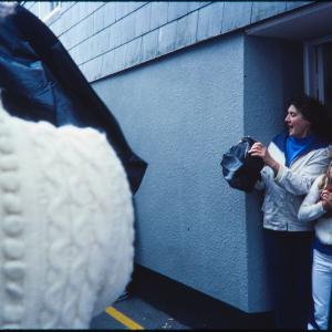 People watching from doorway