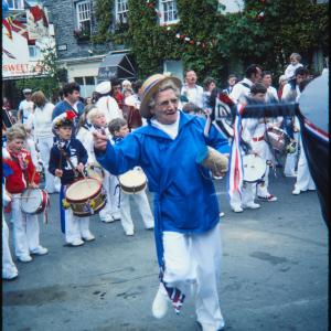 Woman dancing in procession