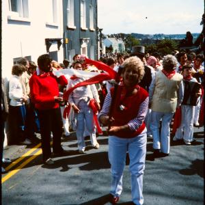 Woman leading Old Oss procession