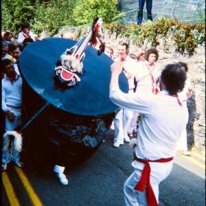Old Oss being teased in procession