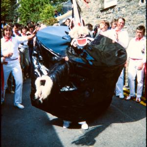 Old Oss being teased in procession