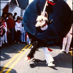 Old Oss being teased in procession