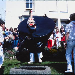 Old Oss being teased in garden of house