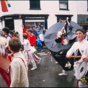 Children's Oss procession in the rain