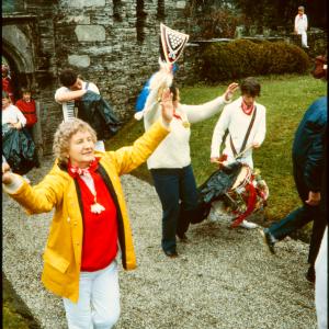 Old Oss teaser walking through Prideaux Place gate in rain