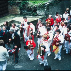 Old Oss band with master of ceremonies in alleyway