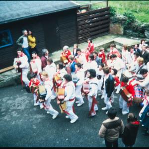 Old Oss band with master of ceremonies in alleyway 