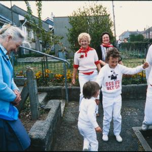 Old Oss children and adults in front garden