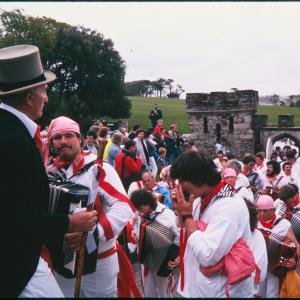 Old Oss Master of Ceremonies stood above procession at Prideaux Place