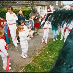 Children from Old Oss teasing on pavement
