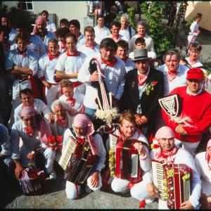 Men from Old Oss posing for group photo