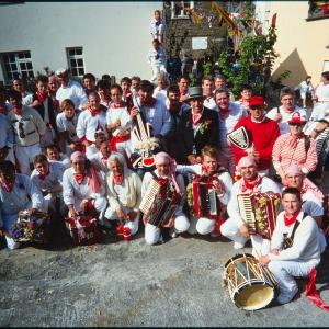 Men from Old Oss posing for group photo